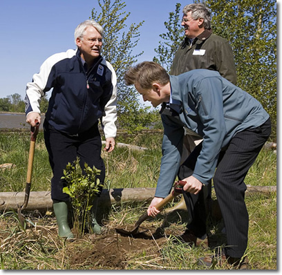 Premier Gordon Campbell and Environment Minister Barry Penner joined John Woodward, chair of the Living Rivers Advisory Group, to plant native plant species on the banks of the Fraser River after announcing the Province will triple funding for the Living Rivers Trust Fund to $21 million.